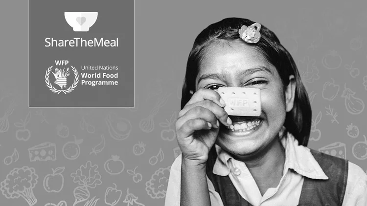 ShareTheMeal 2021 Mädchen mit Keks